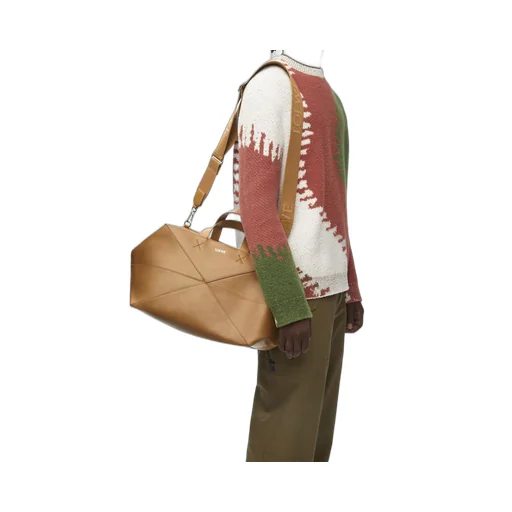 Medium Puzzle Fold duffle in shiny calfskin