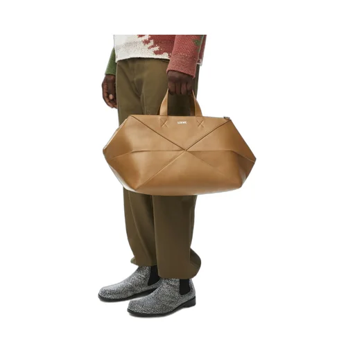 Medium Puzzle Fold duffle in shiny calfskin
