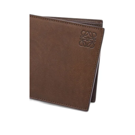Bifold coin wallet in vegetable-tanned calfskin