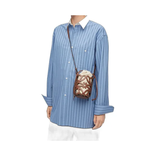 Anagram cut-out pocket in classic calfskin and canvas