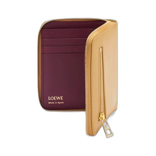 Knot compact zip around wallet in shiny nappa calfskin