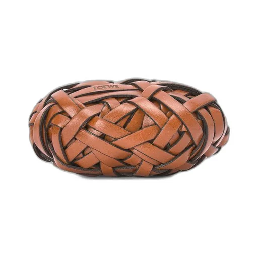 Nest woven paperweight in stone and calfskin