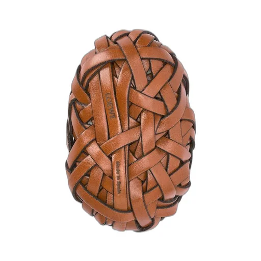 Nest woven paperweight in stone and calfskin
