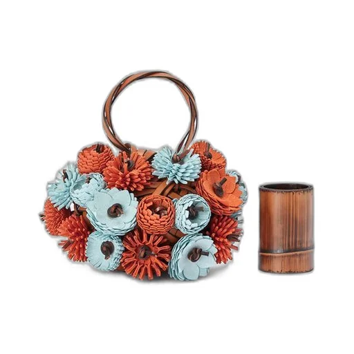 Woven nest vase in calfskin and bamboo