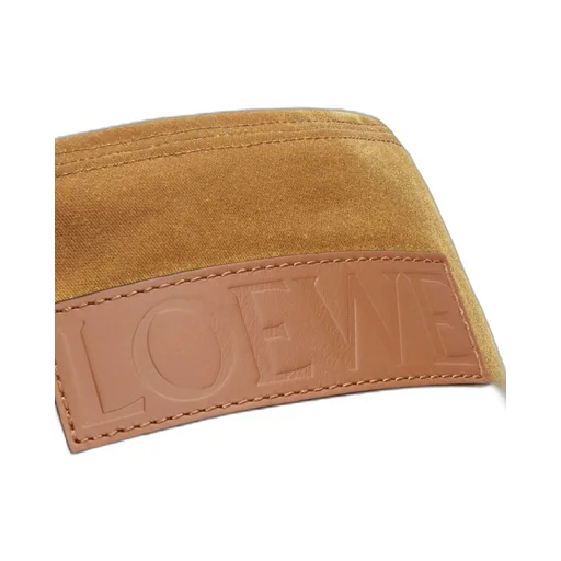 Bucket hat in waxed canvas and calfskin