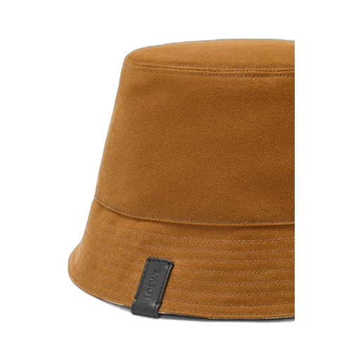 Reversible bucket hat in waxed canvas and tartan