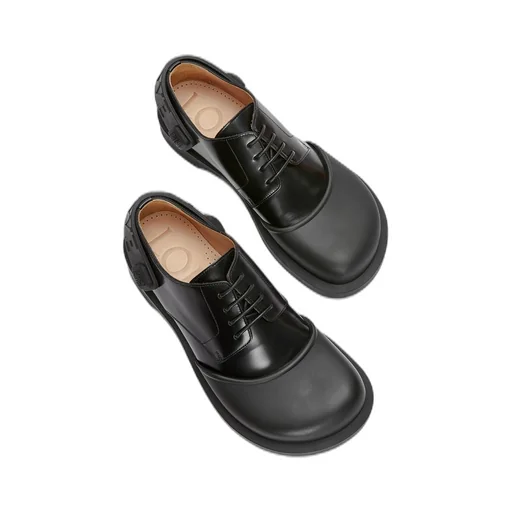 Derby shoe in rubber and brushed-off calfskin