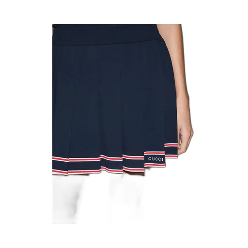 Pleated skirt with striped trim