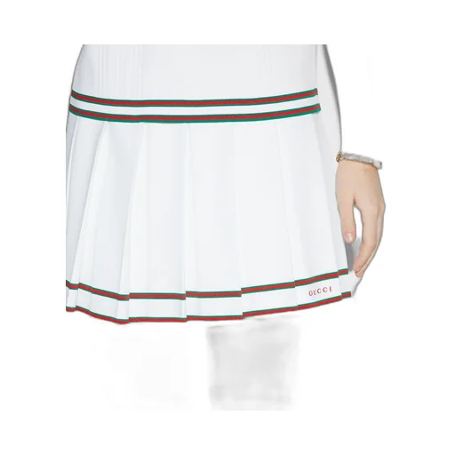 Short pleated skirt with striped trim