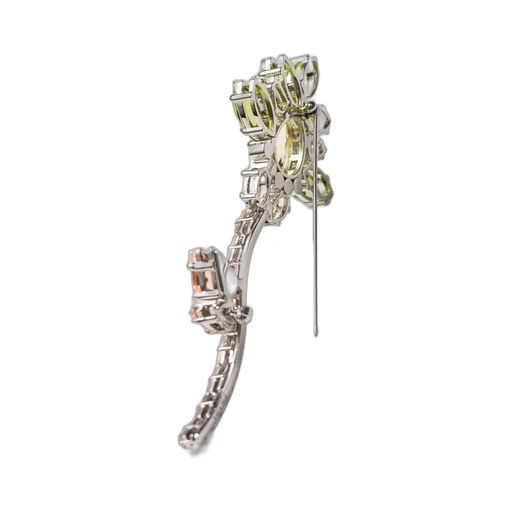 Metal brooch with crystals