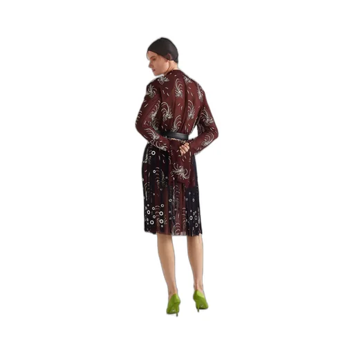 Midi-skirt with fringe and grommet embellishment