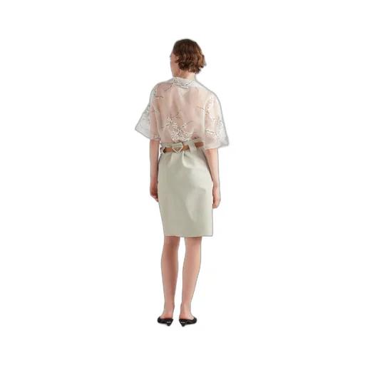 Shirt with superimposed embroidery