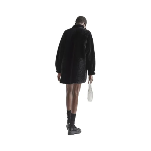 Reversible gabardine and shearling coat