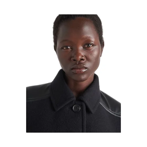 Cropped cloth and leather jacket