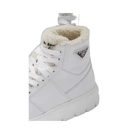 Leather and shearling high-top sneakers