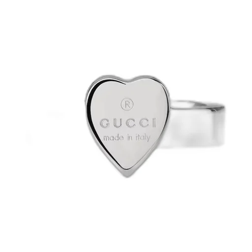 Trademark ring with heart pendant