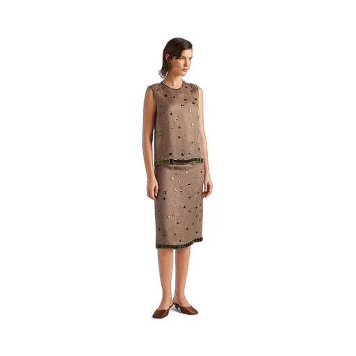 Organza top with grommet embellishment