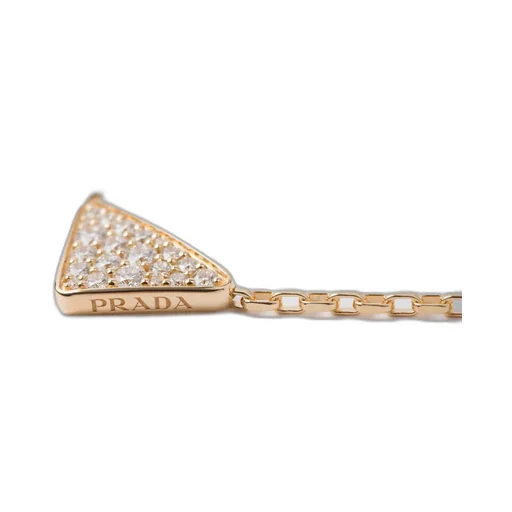 Eternal Gold micro triangle pendant necklace in yellow gold and diamonds