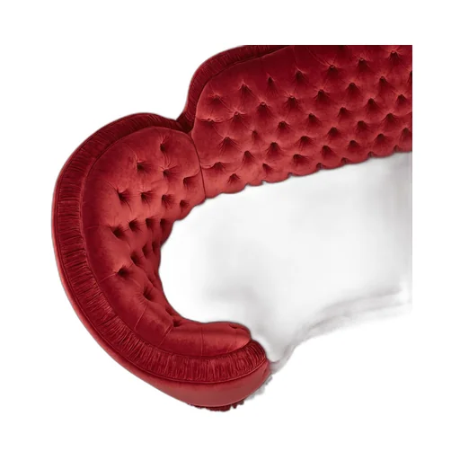 Capitonné camelback sofa