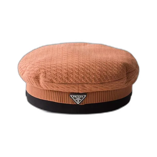 Knit and patent leather cap