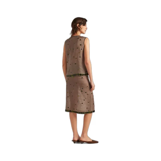 Organza top with grommet embellishment