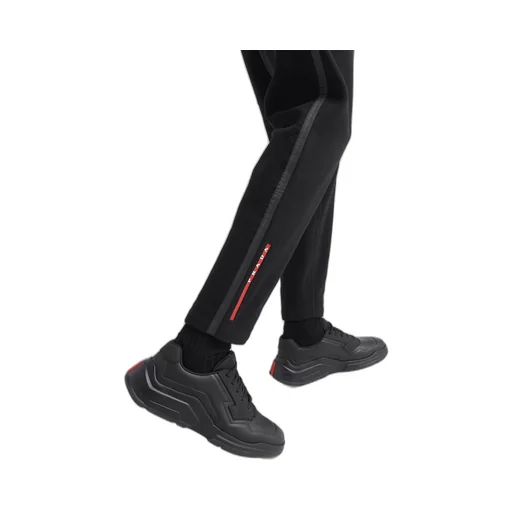 Technical fabric pants with heat-sealed tape