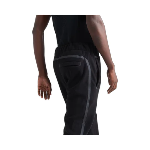 Technical fabric pants with heat-sealed tape