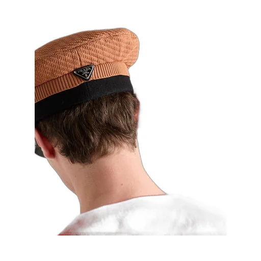 Knit and patent leather cap