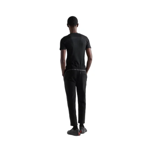 Technical fabric pants with heat-sealed tape
