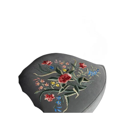 Velvet armchair with embroidered flowers