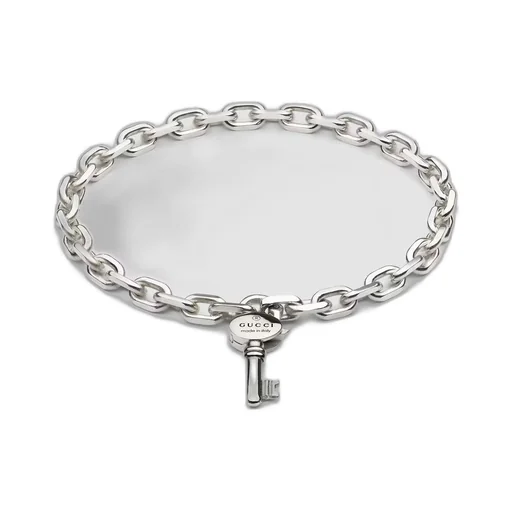 Trademark chain bracelet with key