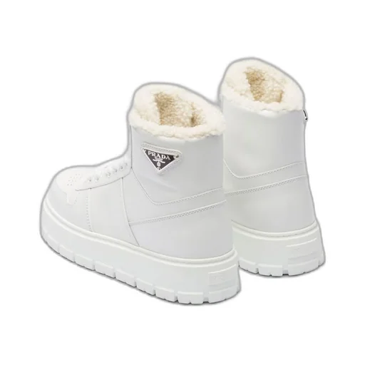 Leather and shearling high-top sneakers