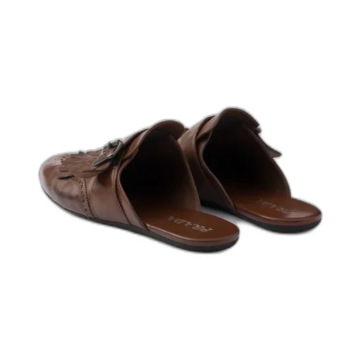 Shuffle Antiqued Leather Mules With Buckled Strap And Fringe