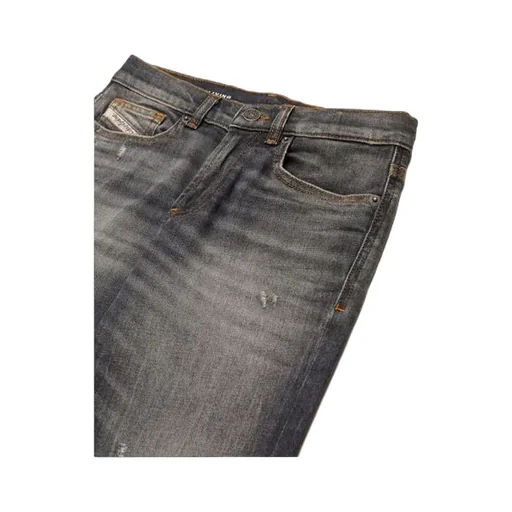 Distressed Tapered Jeans