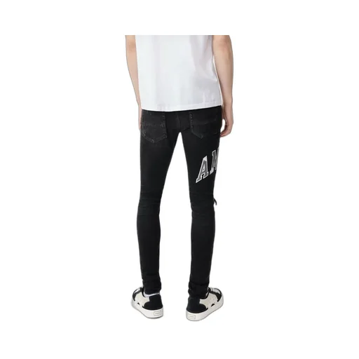 Logo Patch Distressed Skinny Jeans