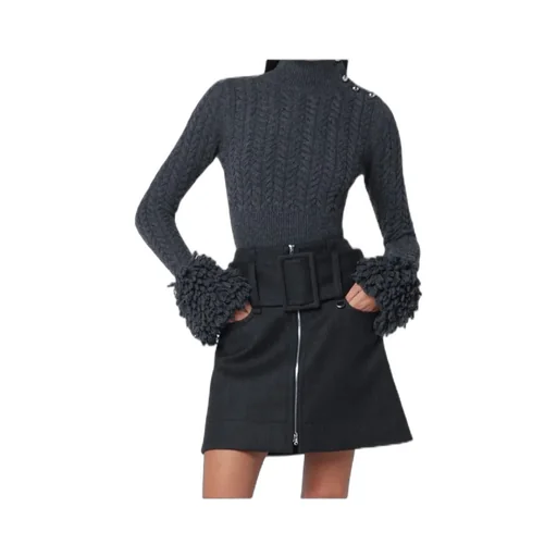 Cable-Knit Sweater With Faux Fur Tassels