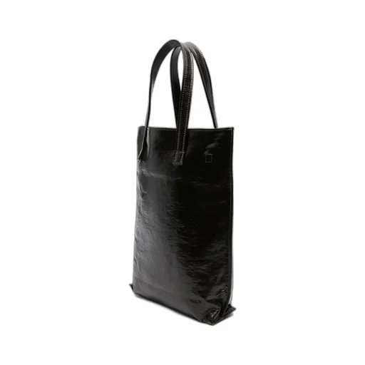 Carry A Handbag With Both Hands