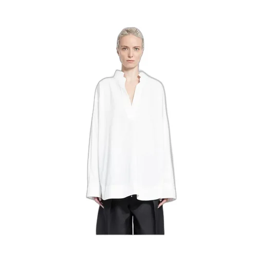 The Tito Curved Hem Top