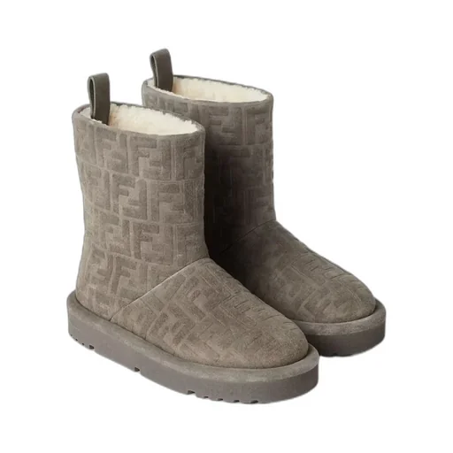 Apres Chic Monogram Embossed Boots