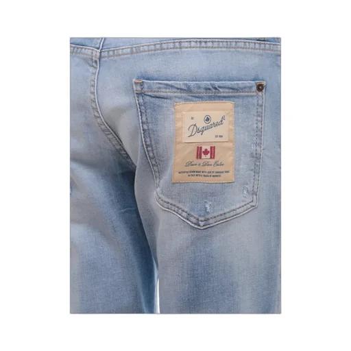 Logo Patch Distressed Tapered-Leg Jeans