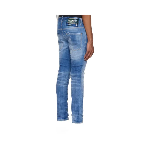 Distressed Tapered-Leg Skinny Jeans