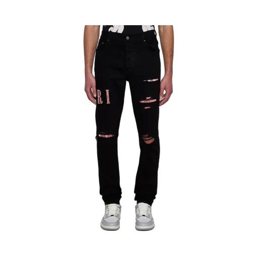 Logo Patch Distressed Skinny Jeans