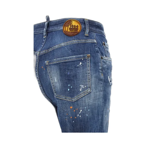 Distressed Tapered Jeans