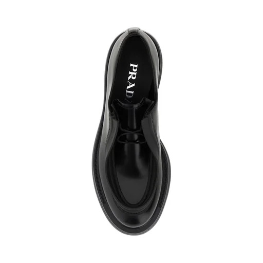 Prada Raised-Edge Round-Toe Lace-Up Shoes