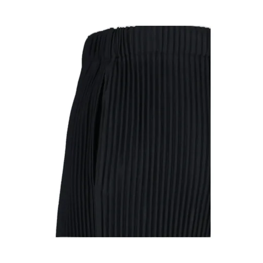 Homme Plissé Issey Miyake Pleated Tapered Leg Trousers