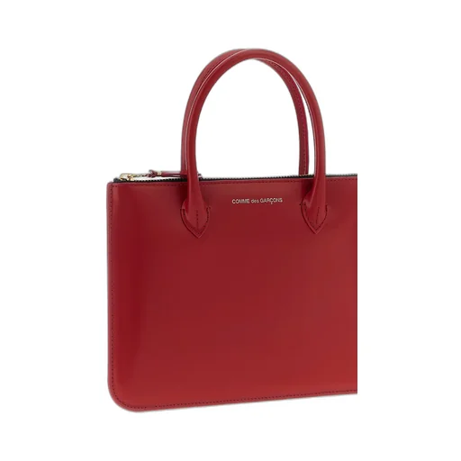 Comme Des GarÇOns Wallet Logo Printed Handbag