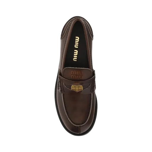Miu Miu Logo Embossed Slip-On Penny Loafers