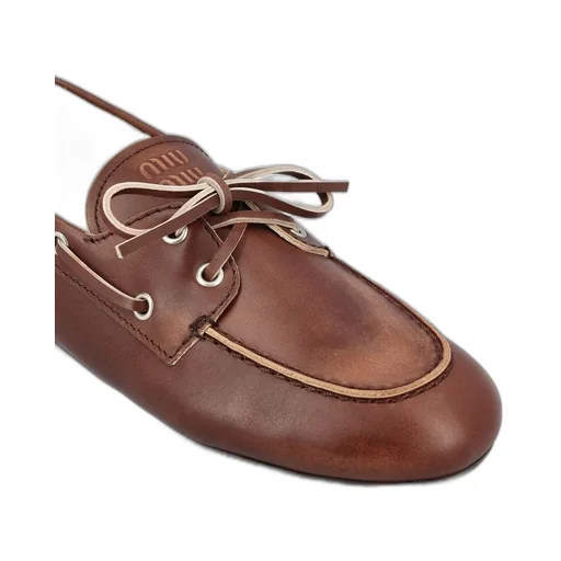 Miu Miu Bleached Slip-On Loafers