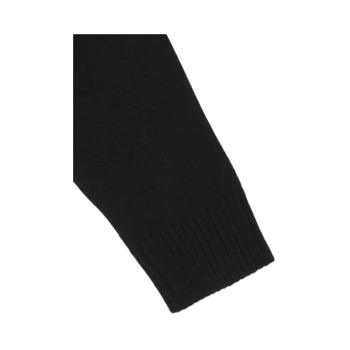 Asymmetrical Design Knit With Fringe Detail Switched To Jacquard Knitting