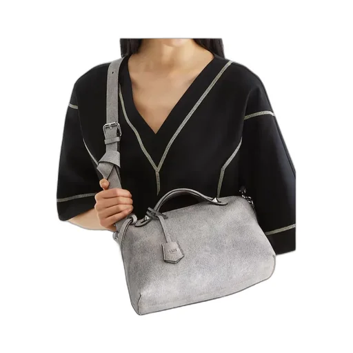 Gray Leather Bag With A Faded Denim Effect.